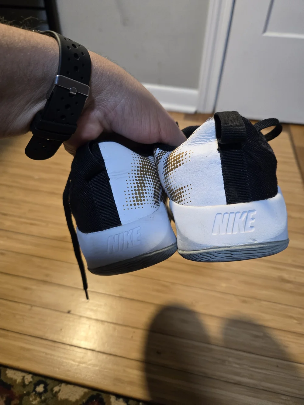 Nike Boy Black and White Basketball Shoes with Gold Accents